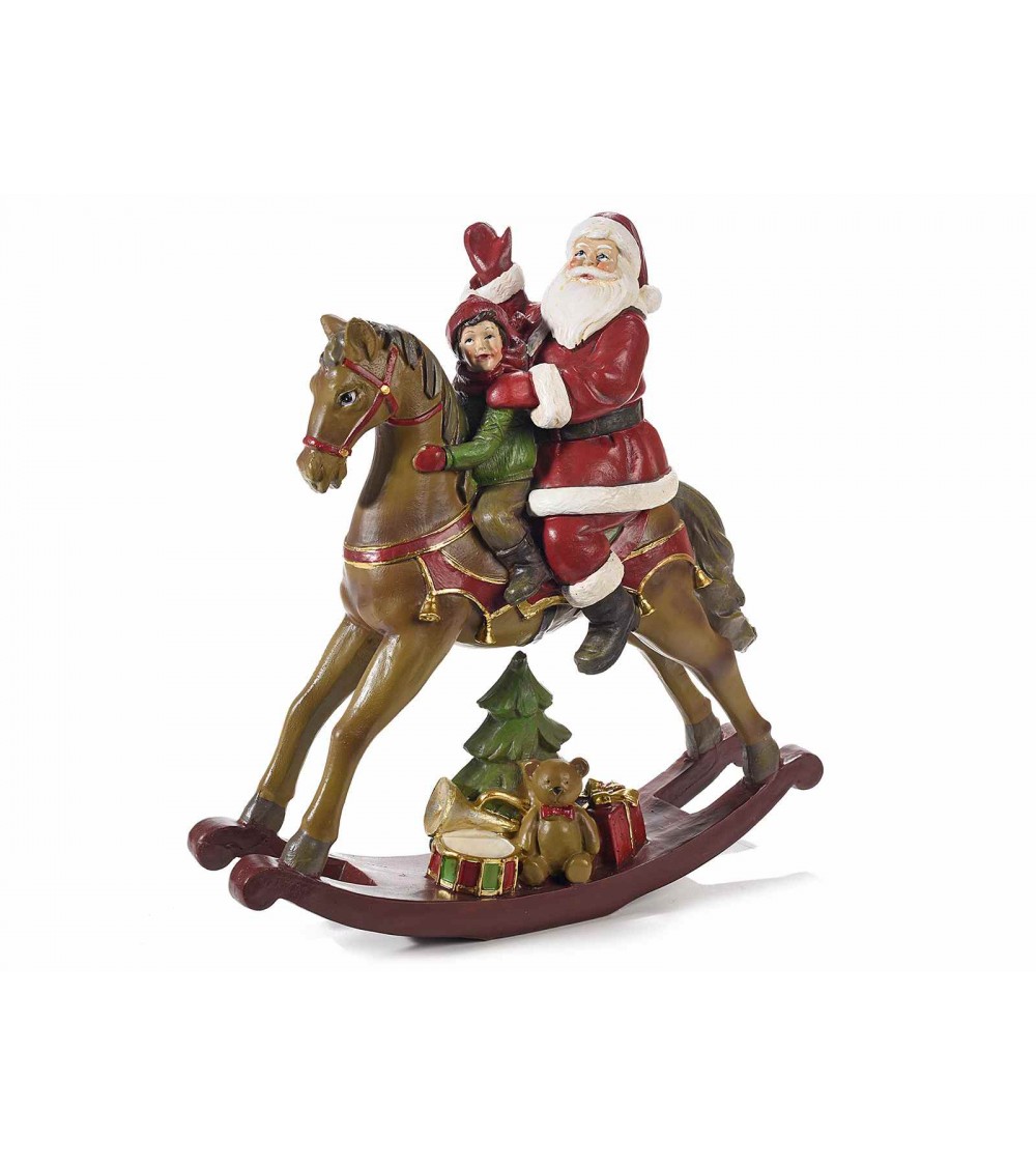 Weihnachtsmann auf Schaukelpferd mit Kind und Geschenken - 