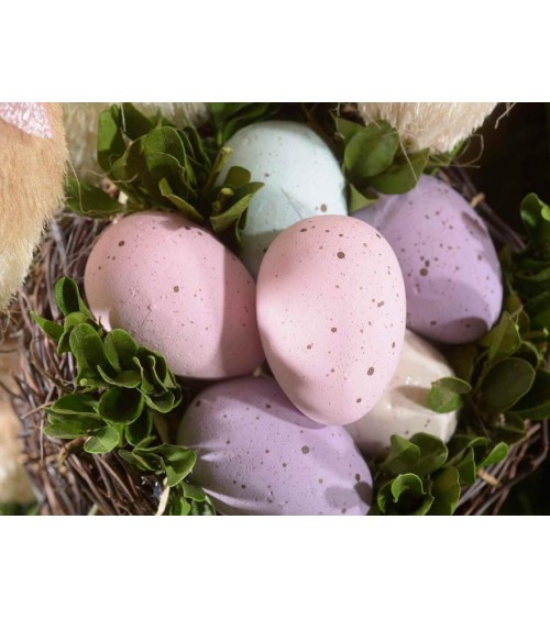 Osterdekorationen: Kaninchen mit Eierkorb -