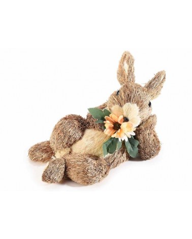 Décoration de Pâques: lapin en fibre naturelle allongé avec fleur -